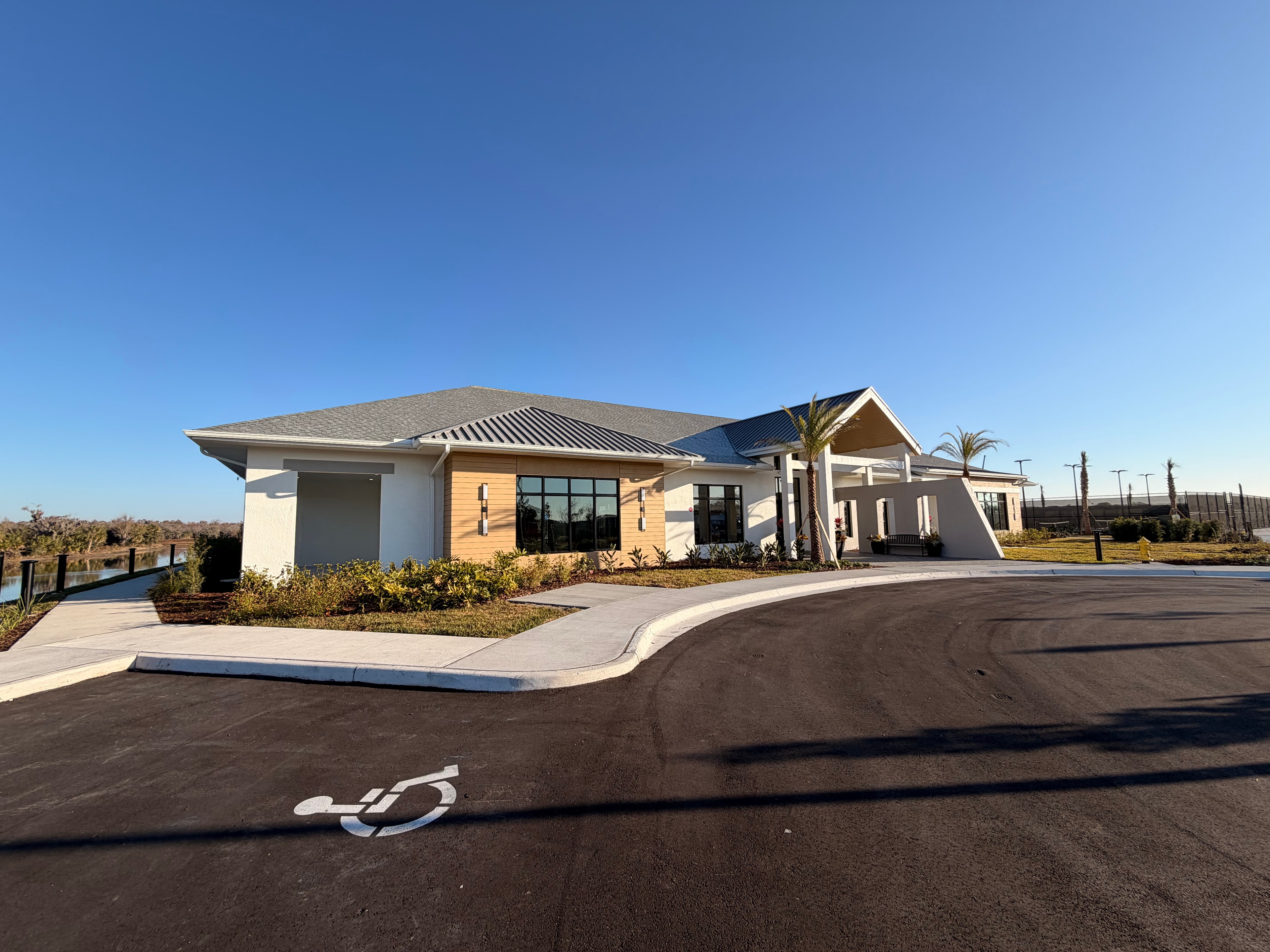 Modern building exterior with parking
