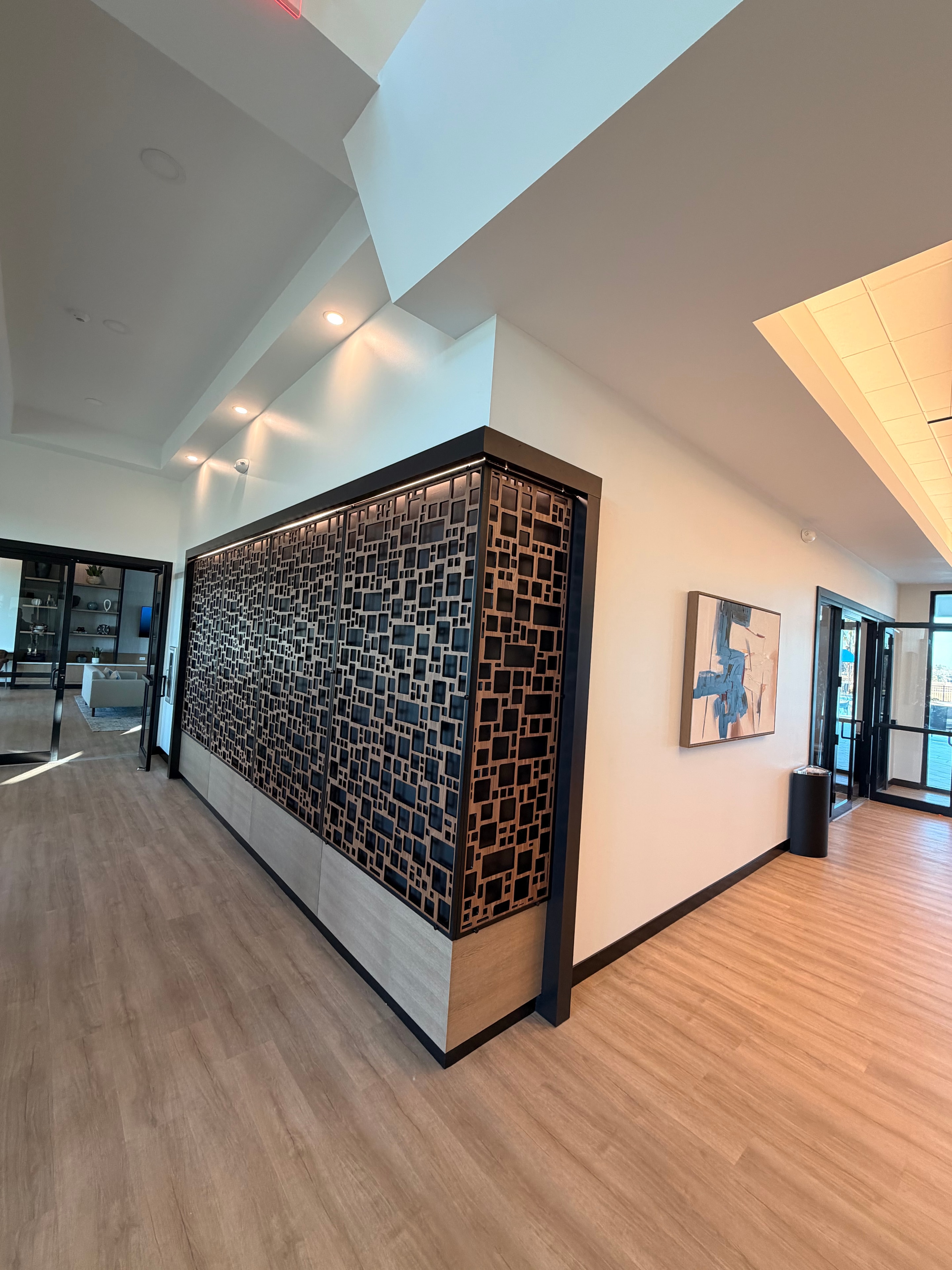 Modern lobby interior with decorative lighting feature wall