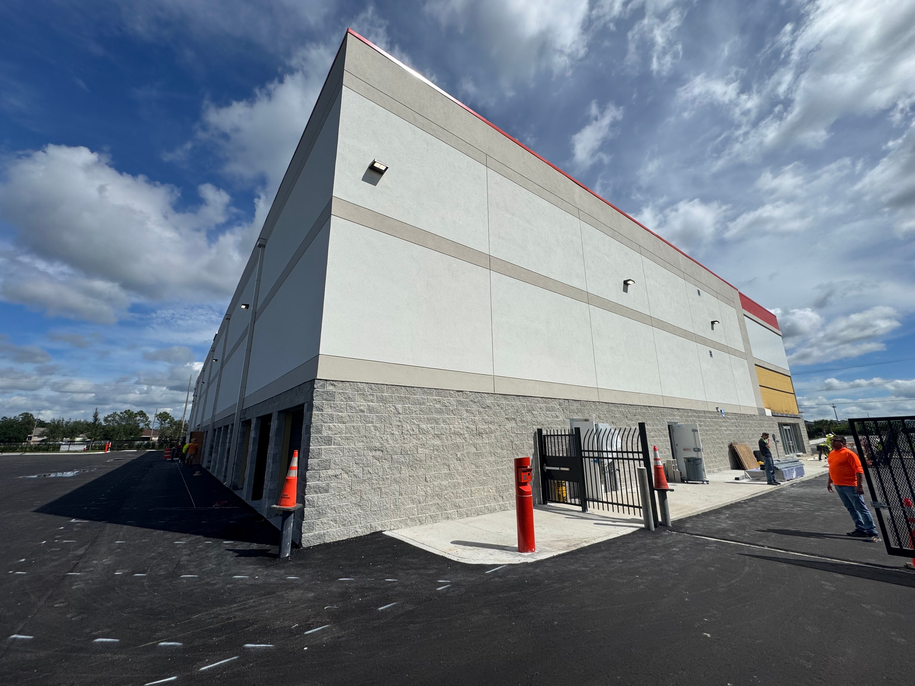 Public Storage building under construction rear corner view with gate
